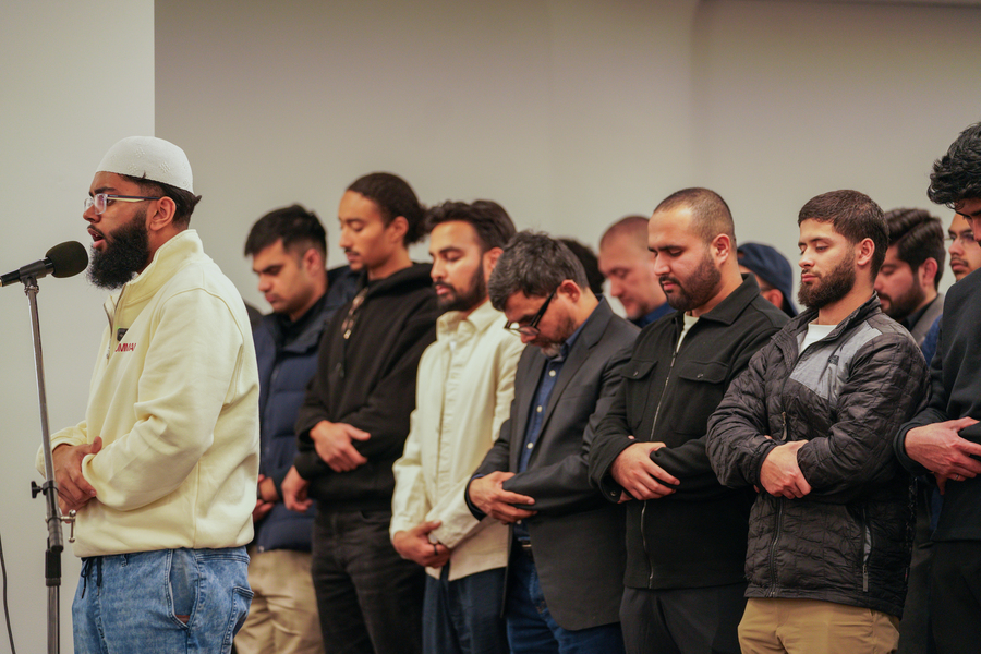 People standing in prayer